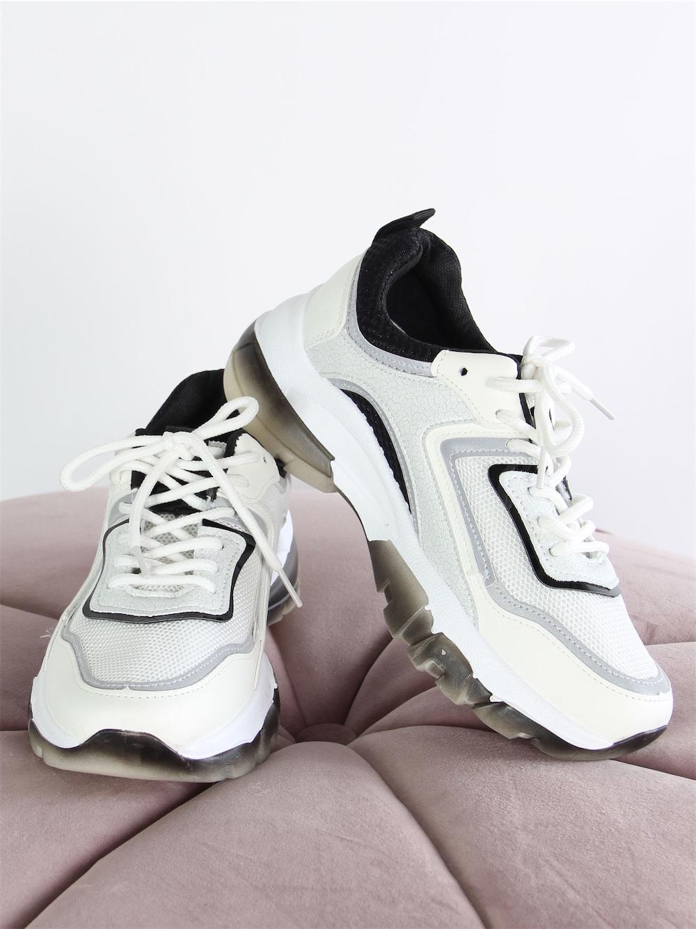 Kourtney - Vit och svart sneaker med reflekterande detaljer